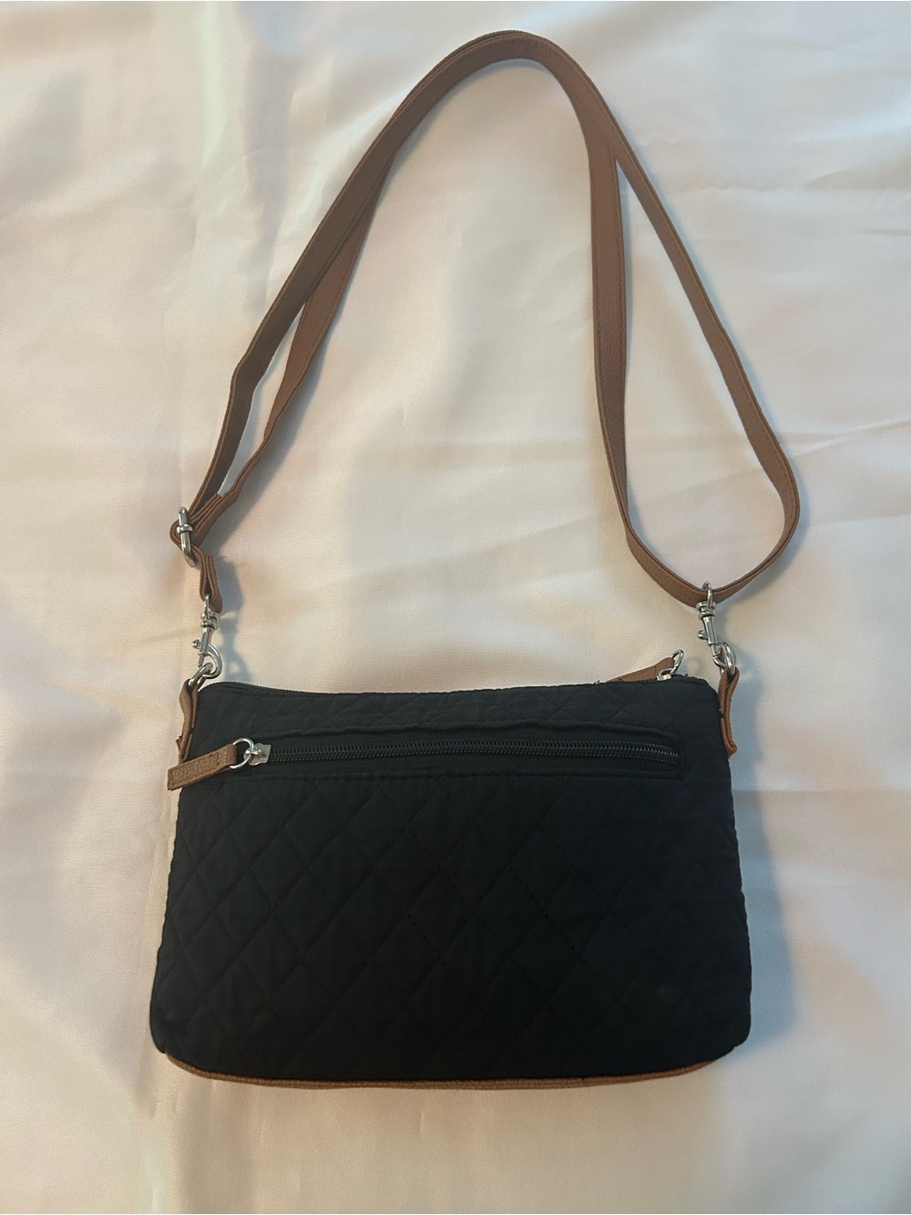 Stone Mountain Women's Black quilted  Crossbody Bag with Tan Strap and accents